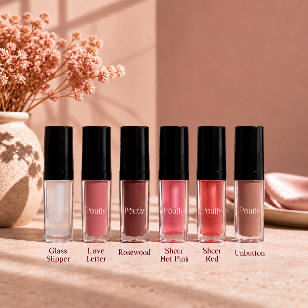 Six Poutly shades labeled from left to right: Glass Slipper, Love Letter, Rosewood, Sheer Hot Pink, Sheer Red, and Unbutton